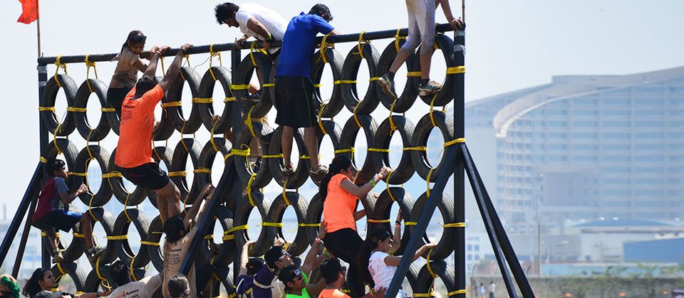 Wall of Tyres obstacle at a Desi Warrior event
