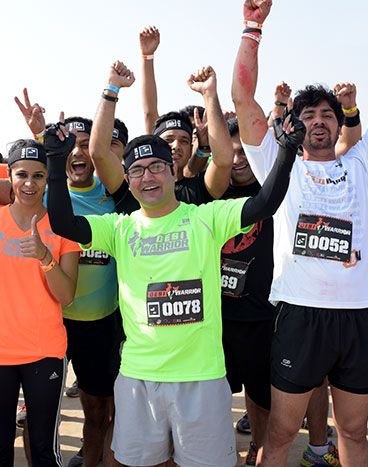 Desi Warriors helping each other on the course